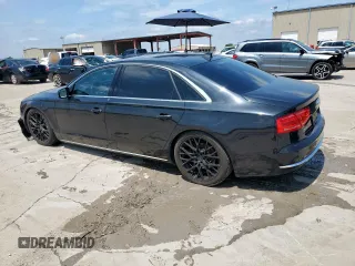 2013 Audi A8 3.0L с VIN WAURGAFD9DN005304, выставлен на аукционе Copart как лот 58799615 с пробегом 139 993 миль миль и Списание • Salvage title. История ставок и продаж доступна на DreamBid. Изображение 2.