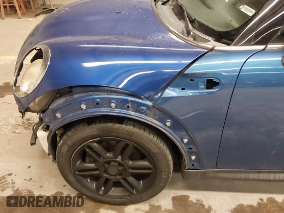 2015 MINI Convertible z VIN WMWZN3C58FT861657, wystawiony jako IAAI lot #41562206 z przebiegiem 135 524 mil mil oraz . Historia ofert i sprzedaży dostępna na DreamBid. Obrazek 13.