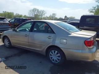 2006 Toyota Camry STD with VIN 4T1BE32K16U680241, listed as a IAAI auction lot 42002721 with 188,867 mi miles. Bid and sale history available at carsss.com. Image 14.