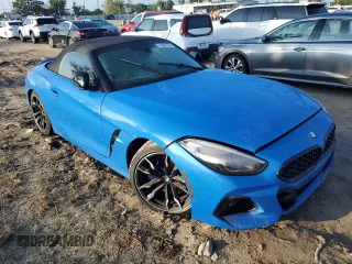 2021 BMW Z4 sDriveM40i with VIN WBAHF9C07MWX29534, listed as a Copart auction lot 73857274 with 0 mi miles and Salvage Title. Bid and sale history available at carsss.com. Image 4.