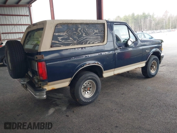 1993 Ford Bronco XL with VIN 1FMEU15N1PLB29714, listed as a IAAI auction lot 41984437 with 165,195 mi miles. Bid and sale history available at carsss.com. Image 4.