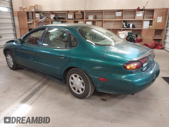 1996 Ford Taurus GL z VIN 1FALP52U5TG110582, wystawiony jako IAAI lot #40858639 z przebiegiem 57 965 mil mil oraz . Historia ofert i sprzedaży dostępna na DreamBid. Obrazek 3.