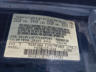 2007 Nissan Versa SL z VIN 3N1BC13E77L439385, wystawiony jako IAAI lot #41749821 z przebiegiem 137 521 mil mil oraz . Historia ofert i sprzedaży dostępna na DreamBid. Obrazek 9.