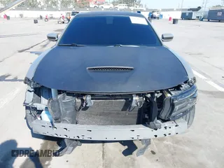 2019 Dodge Charger Scat Pack with VIN 2C3CDXGJ4KH576394, listed as a IAAI auction lot 41846702 with 70,209 mi miles and . Bid and sale history available at DreamBid. Image 6.