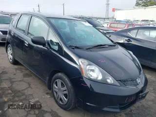 2010 Honda Fit with VIN JHMGE8H29AC037888, listed as a IAAI auction lot 41784180 with 64,855 mi miles. Bid and sale history available at carsss.com. Image 1.