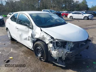 2016 Toyota Corolla L z VIN 2T1BURHE9GC518514, wystawiony jako IAAI lot #41286825 z przebiegiem 144 579 mil mil oraz . Historia ofert i sprzedaży dostępna na DreamBid. Obrazek 1.