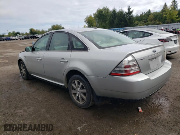 2009 Ford Taurus SEL with VIN 1FAHP24W79G110613, listed as a Copart auction lot 72397834 with 212,234 mi miles and Salvage Title. Bid and sale history available at carsss.com. Image 2.
