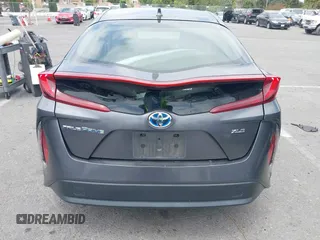 2021 Toyota Prius LE with VIN JTDKAMFP0M3193305, listed as a IAAI auction lot 42283494 with 322,523 mi miles and . Bid and sale history available at DreamBid. Image 16.