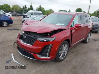 2024 Cadillac XT6 AWD Premium Luxury with VIN 1GYKPDRSXRZ724989, listed as a IAAI auction lot 42378559 with 22,520 mi miles and . Bid and sale history available at DreamBid. Image 2.