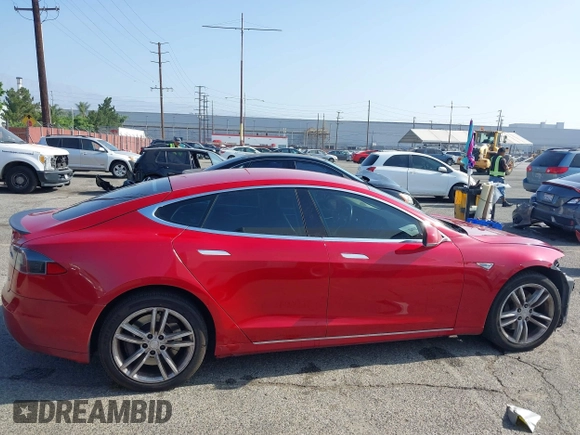 2014 Tesla Model S 60 z VIN 5YJSA1H16EFP42727, wystawiony jako IAAI lot #42544475 z przebiegiem 166 877 mil mil oraz . Historia ofert i sprzedaży dostępna na DreamBid. Obrazek 14.