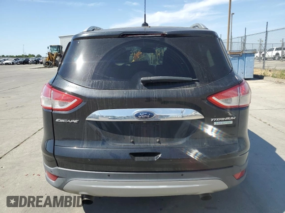 2015 Ford Escape Titanium with VIN 1FMCU0J97FUC80446, listed as a Copart auction lot 58749895 with 106,890 mi miles and Salvage title. Bid and sale history available at DreamBid. Image 6.