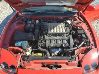 1995 Mitsubishi 3000GT GT z VIN JA3AM84JXSY003887, wystawiony jako Copart lot #77648954 z przebiegiem 109 738 mil mil oraz Tytuł czysty. Historia ofert i sprzedaży dostępna na DreamBid. Obrazek 11.