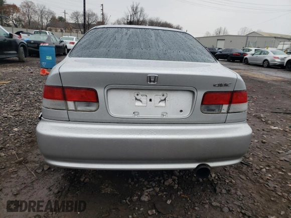 1999 Honda Civic EX with VIN 1HGEJ8140XL066559, listed as a Copart auction lot 82600804 with 323,648 mi miles and Salvage Title. Bid and sale history available at carsss.com. Image 6.