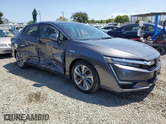 2018 Honda Clarity Touring z VIN JHMZC5F36JC014495, wystawiony jako Copart lot #56139675 z przebiegiem 75 020 mil mil oraz Szkoda całkowita • Salvage title. Historia ofert i sprzedaży dostępna na DreamBid. Obrazek 4.