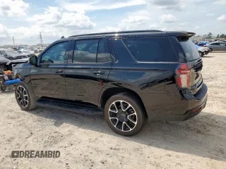 2023 Chevrolet Tahoe RST с VIN 1GNSCRKD5PR442970, выставлен на аукционе Copart как лот 59671735 с пробегом 13 975 миль миль и Списание • Salvage title. История ставок и продаж доступна на DreamBid. Изображение 2.