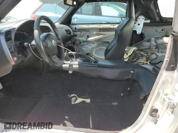 2002 Honda S2000 z VIN JHMAP11442T000235, wystawiony jako Copart lot #59429155 z przebiegiem 142 845 mil mil oraz Szkoda całkowita • Salvage title. Historia ofert i sprzedaży dostępna na DreamBid. Obrazek 7.
