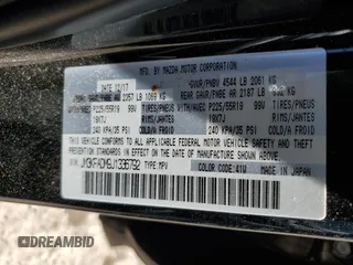 2018 Mazda CX-5 Grand Touring with VIN JM3KFADM9J1336792, listed as a Copart auction lot 52209435 with 107,852 mi miles and Salvage Title. Bid and sale history available at DreamBid. Image 13.
