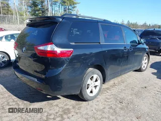 2015 Toyota Sienna LE AAS with VIN 5TDKK3DCXFS594370, listed as a IAAI auction lot 41910126 with 131,638 mi miles. Bid and sale history available at carsss.com. Image 4.