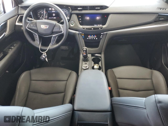2021 Cadillac XT5 FWD Premium Luxury с VIN 1GYKNCRSXMZ155473, выставлен на аукционе Copart как лот 59883874 с пробегом 2 038 миль миль и Списание • Salvage title. История ставок и продаж доступна на DreamBid. Изображение 8.