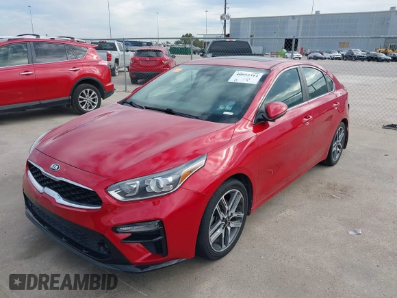 2021 Kia Forte EX with VIN 3KPF54AD1ME404443, listed as a IAAI auction lot 40952314 with 108,035 mi miles and . Bid and sale history available at DreamBid. Image 2.