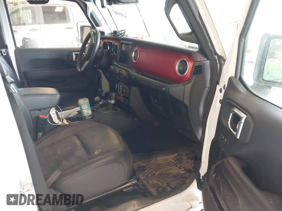 2022 Jeep Wrangler Unlimited Rubicon with VIN 1C4JJXFM0NW154202, listed as a IAAI auction lot 42400067 with 60,486 mi miles and . Bid and sale history available at DreamBid. Image 5.