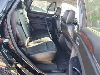2014 Cadillac SRX Premium Collection z VIN 3GYFNGE38ES577313, wystawiony jako Copart lot #87679045 z przebiegiem 92 070 mil mil oraz Szkoda całkowita • Salvage title. Historia ofert i sprzedaży dostępna na DreamBid. Obrazek 10.