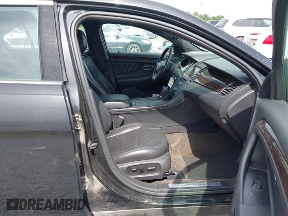2013 Ford Taurus Limited with VIN 1FAHP2F85DG229915, listed as a IAAI auction lot 42511968 with 264,676 mi miles and . Bid and sale history available at DreamBid. Image 5.