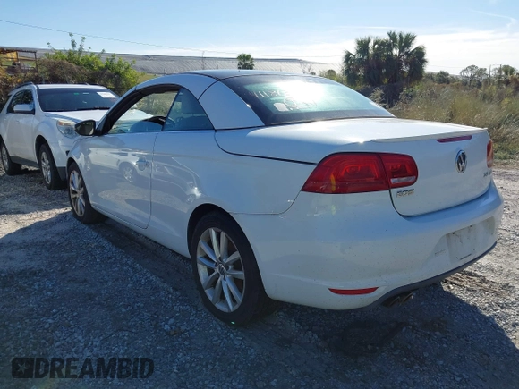 2015 Volkswagen Eos Komfort with VIN WVWBW8AH4FV003067, listed as a IAAI auction lot 41186314 with Not Provided miles and . Bid and sale history available at DreamBid. Image 3.