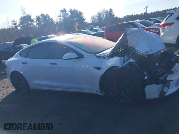 2023 Tesla Model S Plaid with VIN 5YJSA1E64PF512509, listed as a IAAI auction lot 41086678 with Not provided miles and . Bid and sale history available at DreamBid. Image 13.