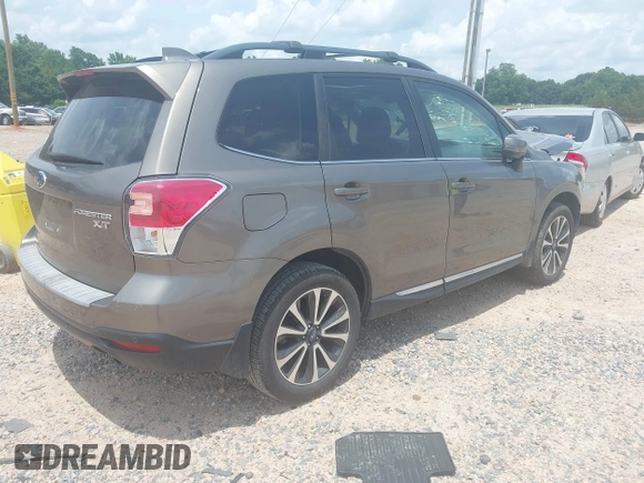 2017 Subaru Forester Touring with VIN JF2SJGWCXHH558789, listed as a IAAI auction lot 42518698 with 112,294 mi miles and . Bid and sale history available at DreamBid. Image 4.
