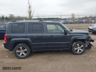 2016 Jeep Patriot Latitude with VIN 1C4NJRFBXGD524016, listed as a IAAI auction lot 40895673 with 157,465 mi miles. Bid and sale history available at carsss.com. Image 13.