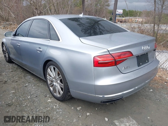 2015 Audi A8 L 4.0T with VIN WAU32AFD7FN021203, listed as a IAAI auction lot 41736045 with 135,471 mi miles. Bid and sale history available at carsss.com. Image 3.