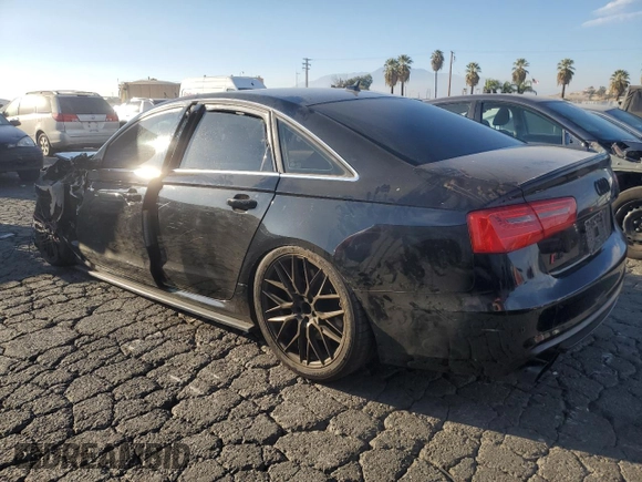 2013 Audi S6 Prestige z VIN WAUJ2AFC7DN143877, wystawiony jako Copart lot #80368324 z przebiegiem Nie podano mil oraz Szkody całkowita. Historia ofert i sprzedaży dostępna na DreamBid. Obrazek 2.