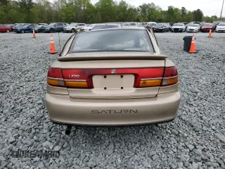 2002 Saturn LS z VIN 1G8JS54F12Y597541, wystawiony jako Copart lot #53327405 z przebiegiem 225 078 mil mil oraz Szkoda całkowita • Salvage title. Historia ofert i sprzedaży dostępna na DreamBid. Obrazek 6.