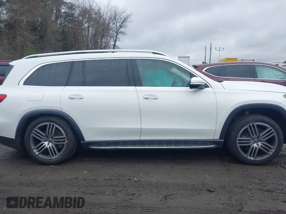 2021 Mercedes-Benz GLS 450 z VIN 4JGFF5KEXMA386713, wystawiony jako IAAI lot #41966263 z przebiegiem 63 039 mil mil oraz . Historia ofert i sprzedaży dostępna na DreamBid. Obrazek 13.