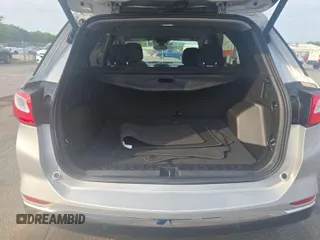 2020 Chevrolet Equinox LT z VIN 2GNAXJEV5L6230548, wystawiony jako IAAI lot #42573168 z przebiegiem 95 519 mil mil oraz . Historia ofert i sprzedaży dostępna na DreamBid. Obrazek 22.