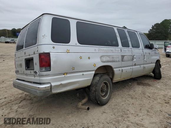 1999 Ford Econoline Passenger XL with VIN 1FBSS31L2XHB54786, listed as a Copart auction lot 80025474 with 418,665 mi miles and Clean Title. Bid and sale history available at DreamBid. Image 3.