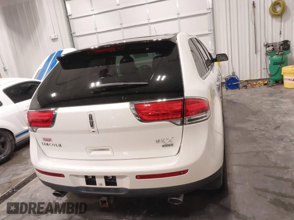 2011 Lincoln MKX with VIN 2LMDJ8JKXBBJ34612, listed as a IAAI auction lot 41775743 with 137,810 mi miles and . Bid and sale history available at DreamBid. Image 16.