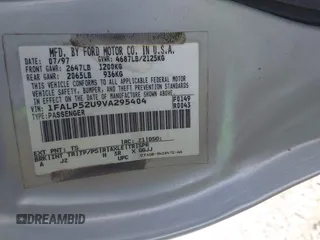 1997 Ford Taurus GL z VIN 1FALP52U9VA295404, wystawiony jako IAAI lot #42234839 z przebiegiem 163 080 mil mil oraz . Historia ofert i sprzedaży dostępna na DreamBid. Obrazek 9.