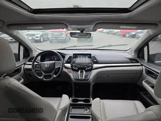2018 Honda Odyssey EX-L with VIN 5FNRL6H75JB064377, listed as a Copart auction lot 56241905 with 103,651 mi miles and Clean Title. Bid and sale history available at DreamBid. Image 9.