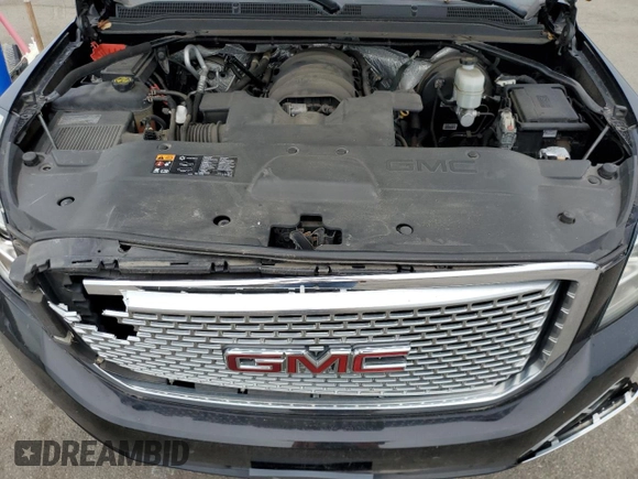 2015 GMC Yukon Denali with VIN 1GKS2CKJXFR277516, listed as a Copart auction lot 72070594 with 86,353 mi miles and Salvage Title. Bid and sale history available at carsss.com. Image 12.