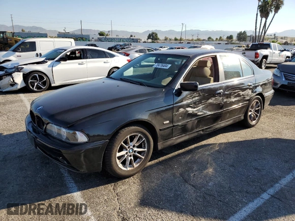 2003 BMW 5 Series 525i with VIN WBADT33433GF43797, listed as a Copart auction lot 70476904 with 194,319 mi miles and Salvage Title. Bid and sale history available at carsss.com. Image 1.