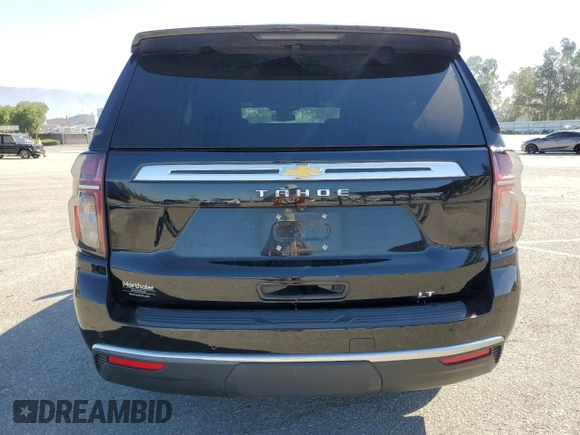 2023 Chevrolet Tahoe LT with VIN 1GNSKNKD5PR262044, listed as a Copart auction lot 63127975 with 34,333 mi miles and Salvage title. Bid and sale history available at DreamBid. Image 6.