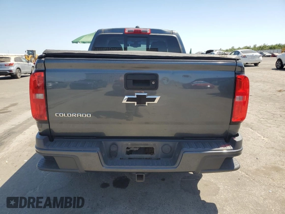 2015 Chevrolet Colorado 2WD Z71 with VIN 1GCGSCE39F1255925, listed as a Copart auction lot 63457735 with 119,801 mi miles and Salvage title. Bid and sale history available at DreamBid. Image 6.