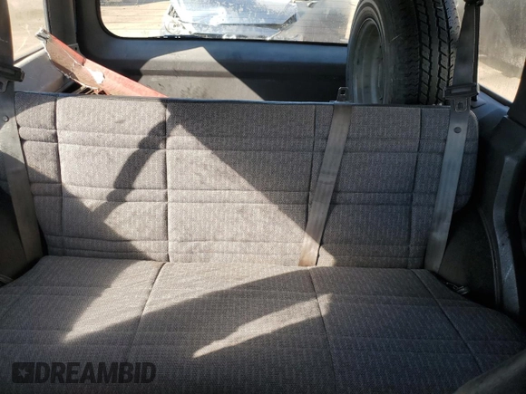 1999 Jeep Cherokee SE with VIN 1J4FT28S6XL515896, listed as a Copart auction lot 83745444 with 192,406 mi miles and Salvage title. Bid and sale history available at DreamBid. Image 10.