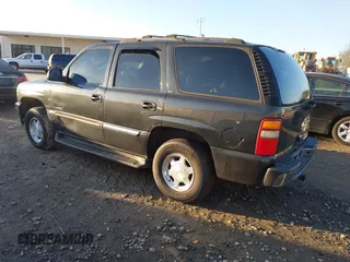 2003 GMC Yukon SLT with VIN 1GKEC13Z53R279530, listed as a IAAI auction lot 41451412 with 308,872 mi miles. Bid and sale history available at carsss.com. Image 3.