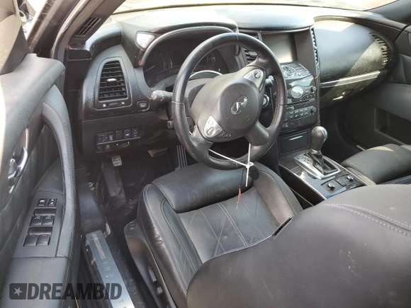 2016 Infiniti QX70 с VIN JN8CS1MUXGM671483, выставлен на аукционе Copart как лот 70624084 с пробегом 88 074 миль миль и На запчасти • Non repairable. История ставок и продаж доступна на DreamBid. Изображение 8.