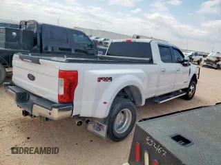 2017 Ford F-350 Lariat with VIN 1FT8W3DT8HEC08097, listed as a Copart auction lot 57352915 with 169,704 mi miles and Salvage title. Bid and sale history available at DreamBid. Image 3.