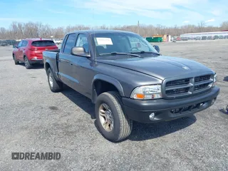 2003 Dodge Dakota Sport with VIN 1D7HG38N73S168586, listed as a IAAI auction lot 41865351 with 149,314 mi miles and . Bid and sale history available at carsss.com. Image 1.