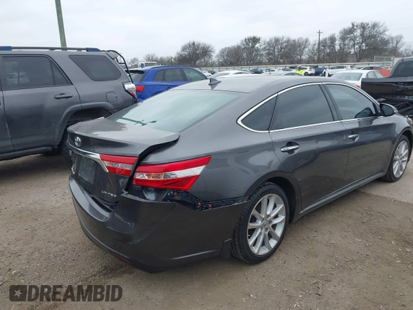 2015 Toyota Avalon Limited with VIN 4T1BK1EB4FU167011, listed as a IAAI auction lot 41582722 with 77,314 mi miles and . Bid and sale history available at DreamBid. Image 4.